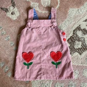 Pink corduroy dress with heart pockets